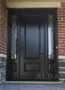 A black fiberglass door with decorative glass
