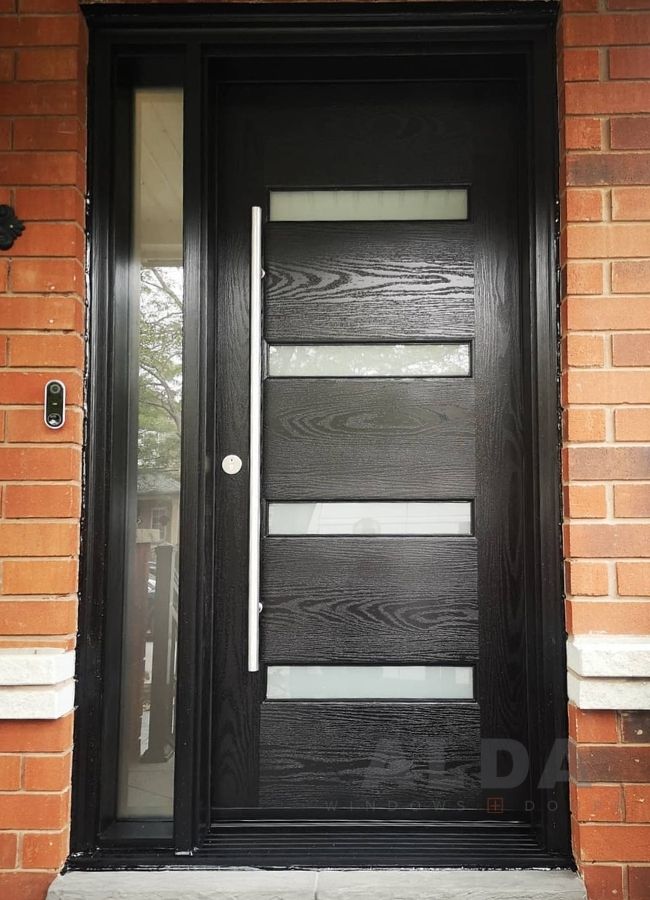A black fiberglass entry door with one sidelight
