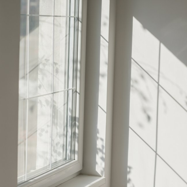 Image depicts a fixed casement window.