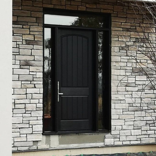 Black fiberglass entry door.