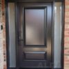 Black front door with frosted sidelights