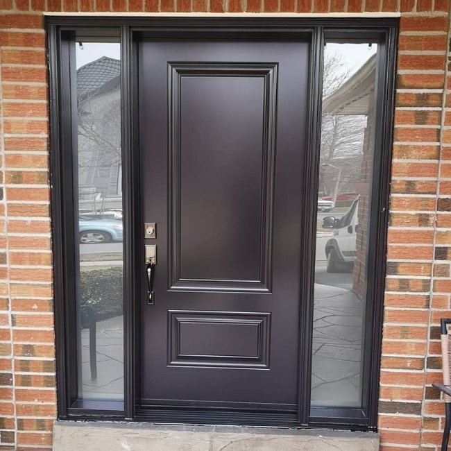 Image depicts a brown entry door with sidelites.