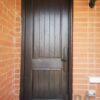 A single brown fiberglass door