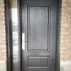 A dark grey fiberglass entry door.