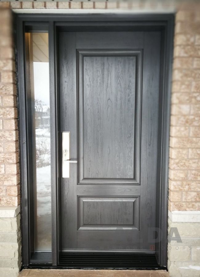 A dark grey fiberglass entry door.