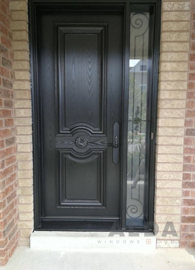 A black fiberglass door with flower pattern