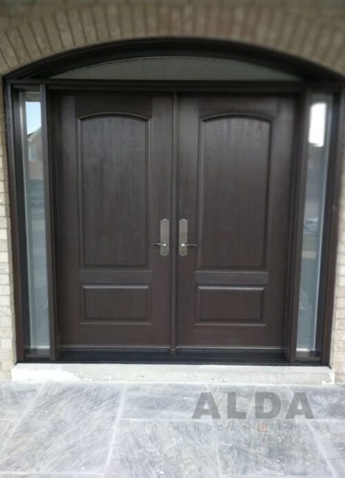 A brown fiberglass entry door with two glasses