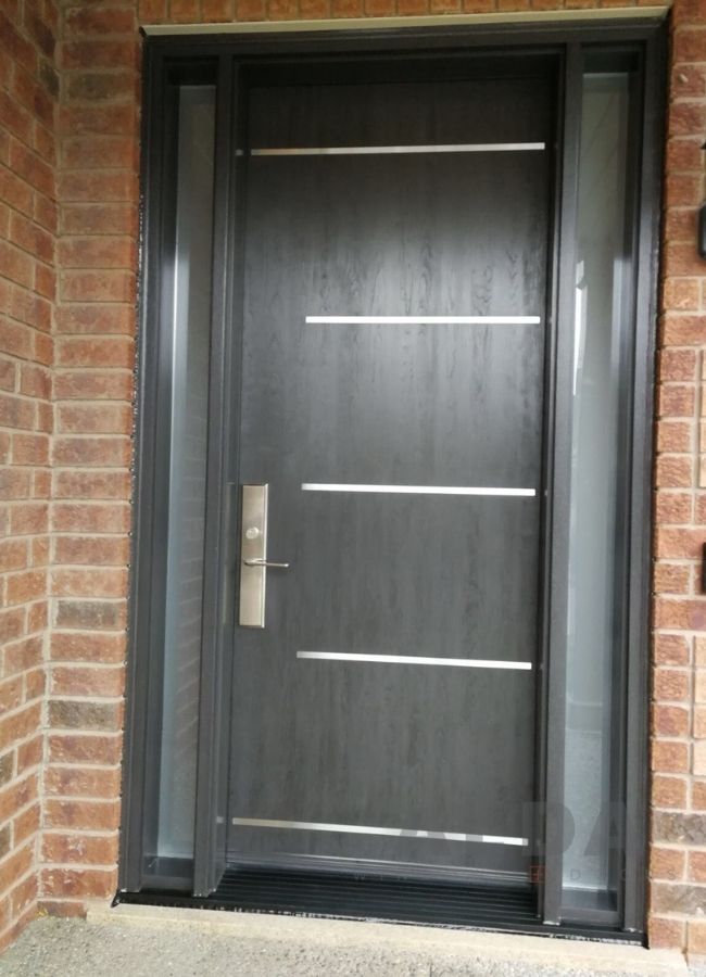 A grey fiberglass door with two glass insert.