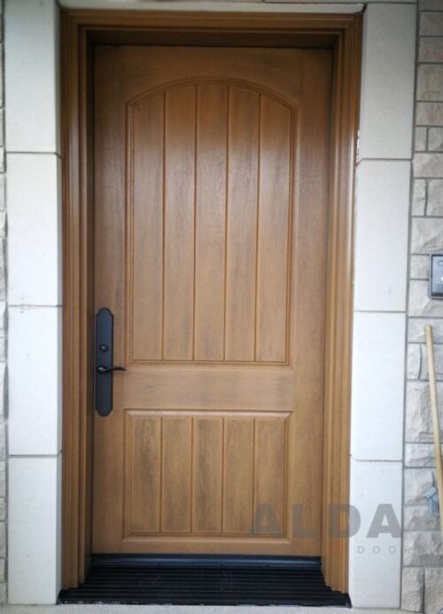 A light brown fiberglass door.
