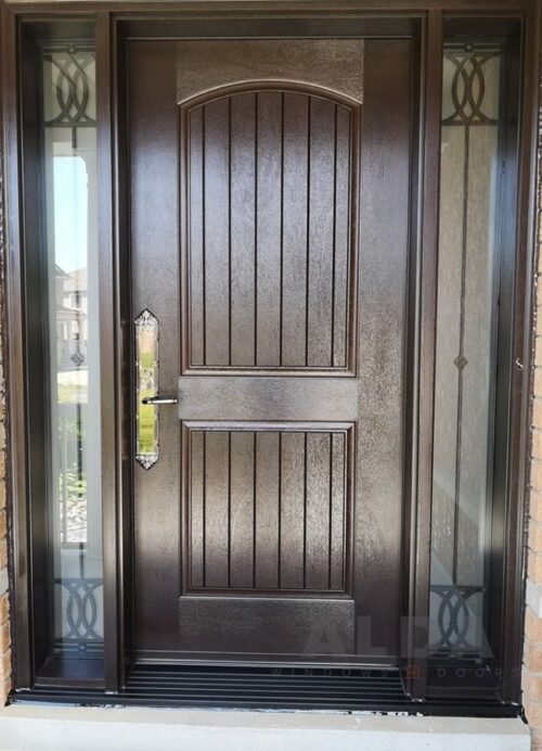 A light brown entry door with two sidelites.