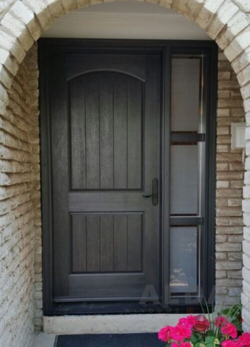 A modern double black fiberglass door with glass inserts.