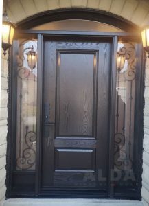A modern brown fiberglass door with two lamps