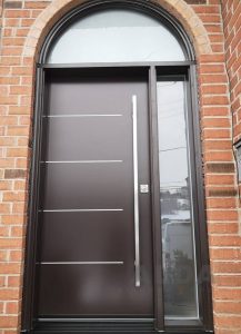 Modern brown steel door with glass