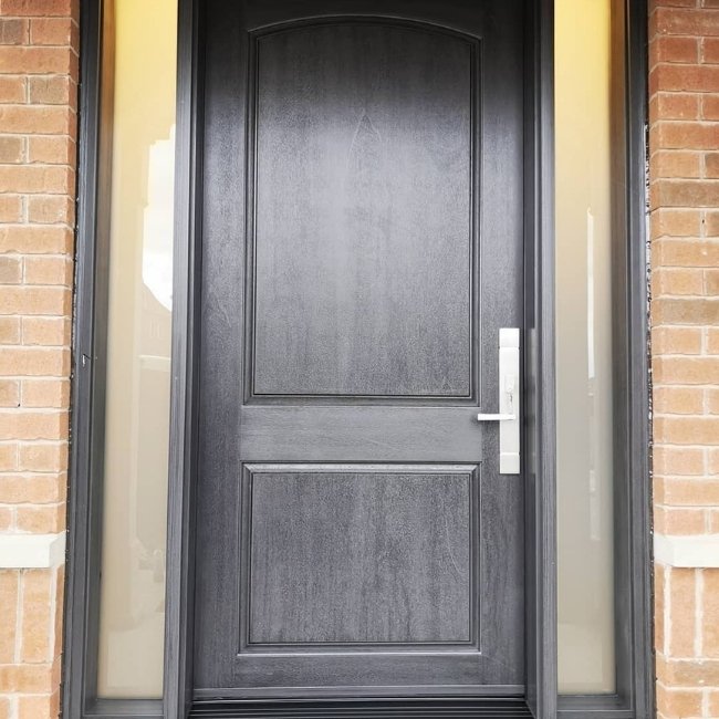 Image depicts a newly installed fiberglass entry door.