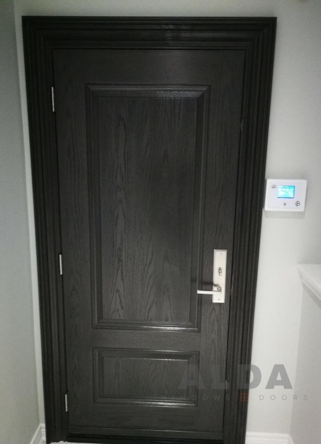 single black fiberglass door with sleek design