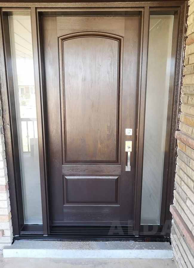 A traditional brown fiberglass door with a glass insert.