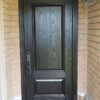A black single fiberglass door