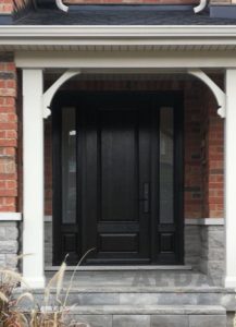 A traditional fiberglass door with two sidelites.