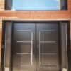 brown steel door with big window upside