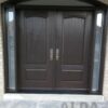 dark brown fiberglass door with two sidelites