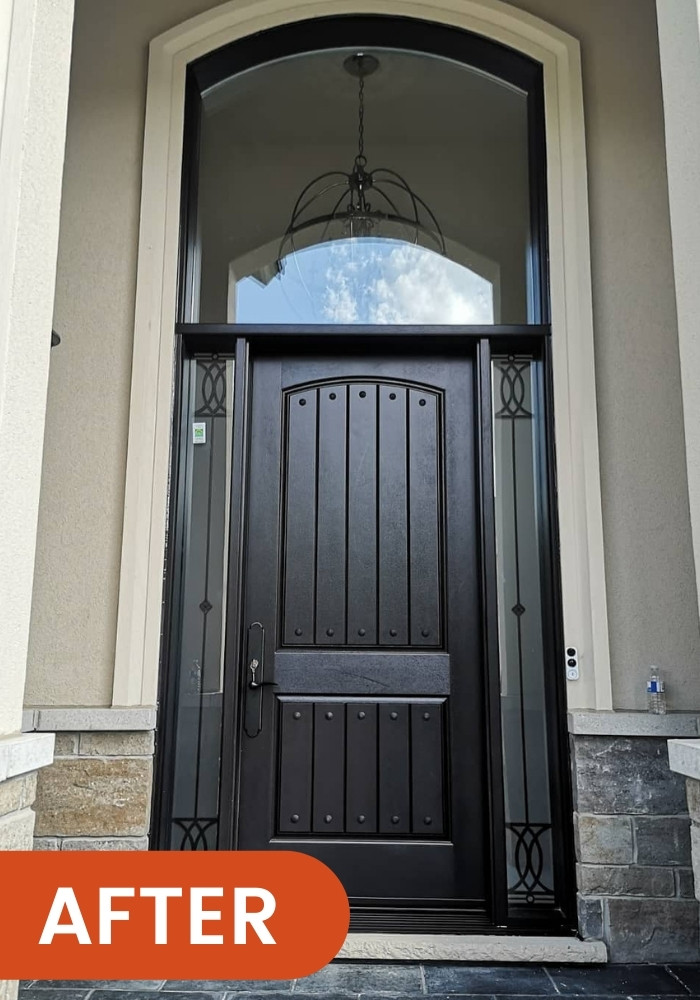 New single black fiberglass entry door in Toronto.