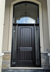 black fiberglass front door with transom