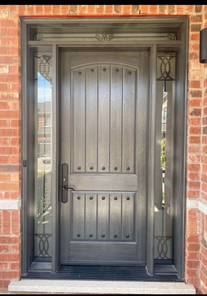 Brown fiberglass front door in Newmarket.