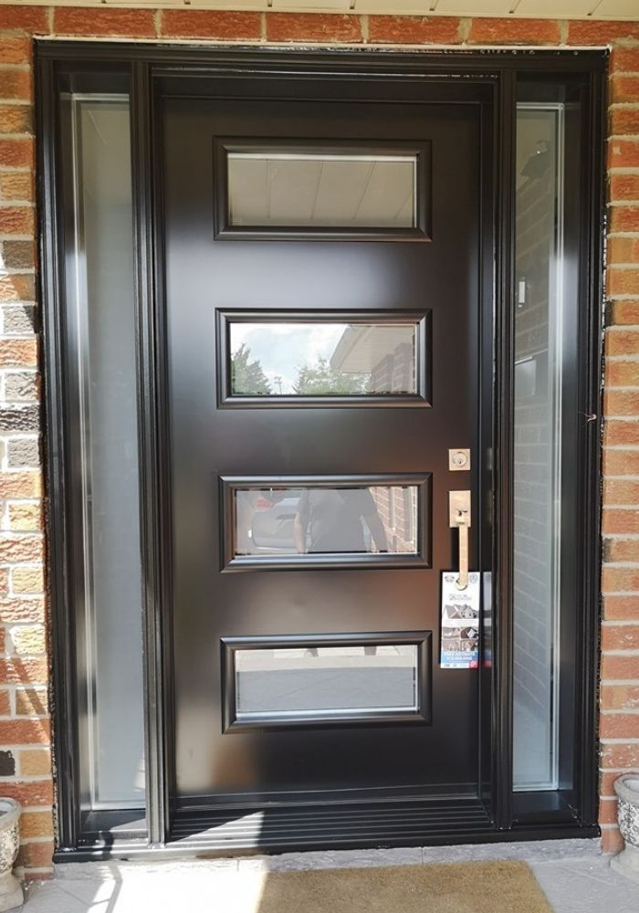 black modern steel door with sidelites and glass inserts