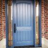 blue-fiberglass-door-with-glass-design-sidelights-and-transom
