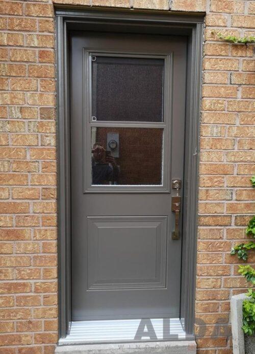 grey steel side door with half glass panels