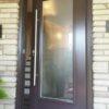 mauve steel door with full glass insert