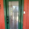 green steel entry door