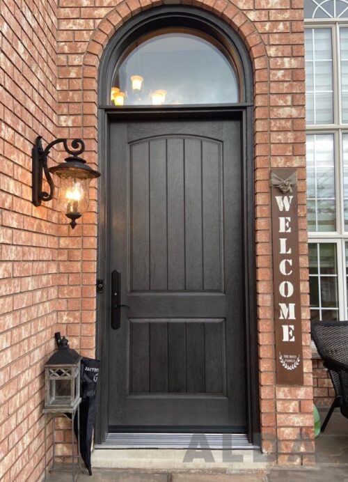 Brown entry door with transom
