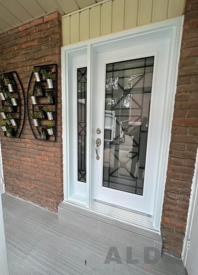 White front door with sidelight