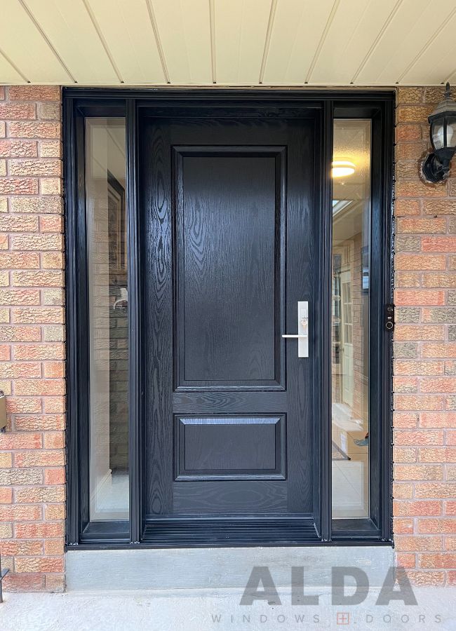 Black entry door with sidelights