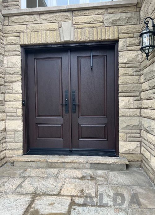 Brown entry door with black door handles