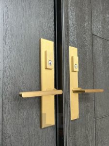 double fiberglass doors golden handles