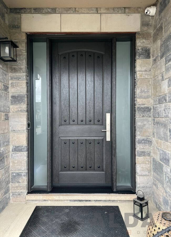 Grey entry door with 2 panel camber plank