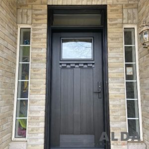 Brown fiberglass door with glass insert and transom