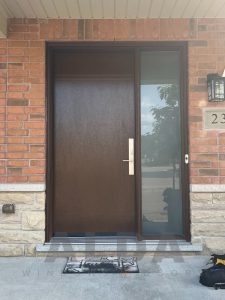 Brown fiberglass door with huge sidelite