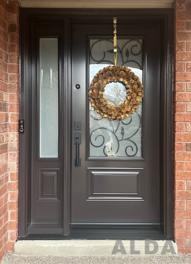 Black entry door with wide glass sidelite