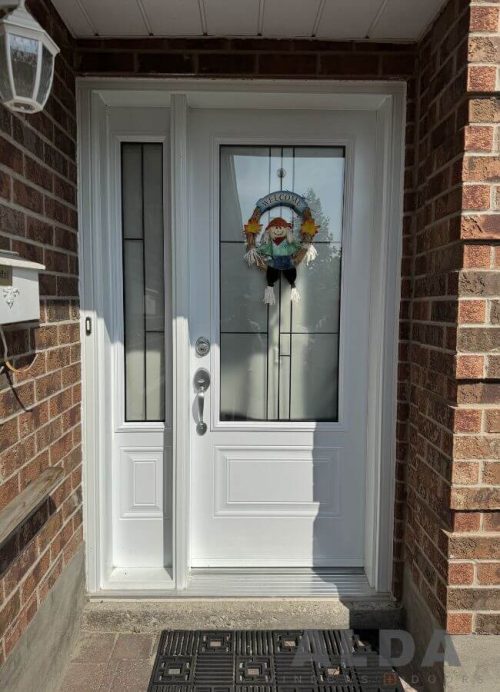 White front door with decorative glass