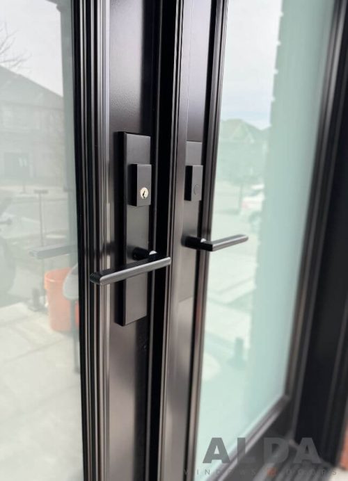 black double door with laminate sandblast glass