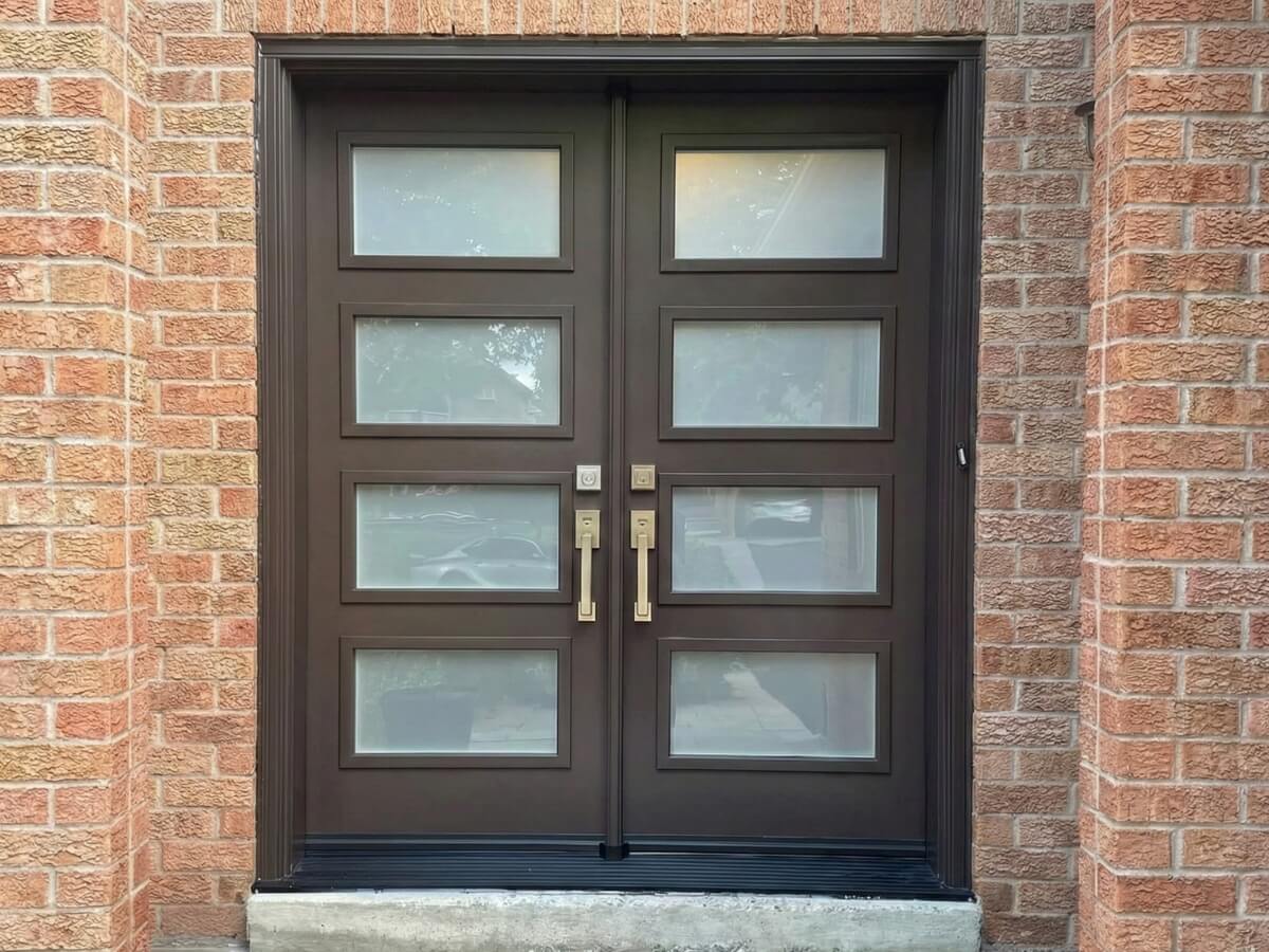 Elegant brown double front doors with multiple glass inserts for a 6-foot entryway, featuring a grand symmetrical design.
