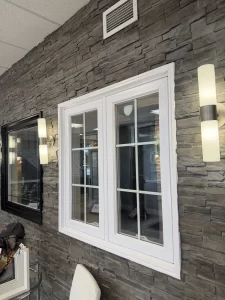 alda showroom white casement window stone wall display